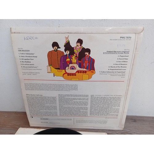 721 - Two The Beatles LP vinyl records, one 'The Beatles' (No. 0496578) and one 'Yellow Submarine'