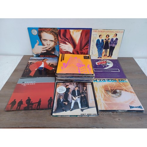 724 - A collection of vinyl records to include Toyah, 'Melody Maker Front Runner II', Southside Johnny and... 