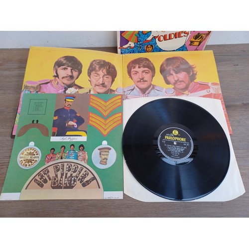 725 - Four LP vinyl records, The Beatles 'Sgt. Pepper's Lonely Hearts Club Band' with insert (mono PMC7027... 