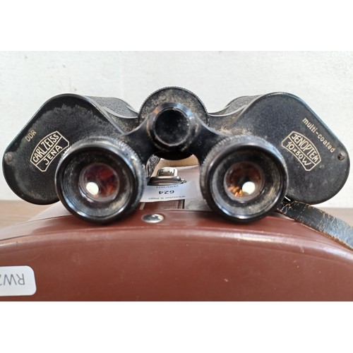 624 - A cased pair of Carl Zeiss Jenoptem 10 x 50w binoculars