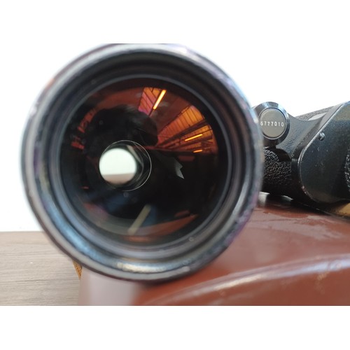 624 - A cased pair of Carl Zeiss Jenoptem 10 x 50w binoculars