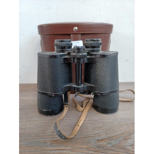 624 - A cased pair of Carl Zeiss Jenoptem 10 x 50w binoculars