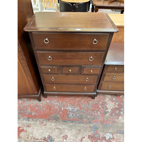 49 - A Stag Minstrel mahogany chest of three short and four long drawers