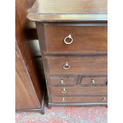 49 - A Stag Minstrel mahogany chest of three short and four long drawers