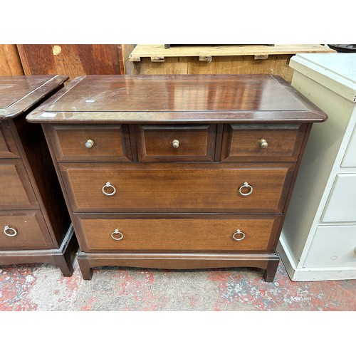 48 - A Stag Minstrel mahogany chest of three short over two long drawers