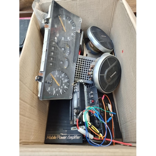 874 - Four boxes containing vintage Ford speedometer, pair of Pioneer car speakers, Nakamichi mobile power... 