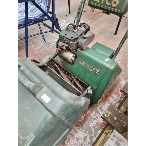 884 - A vintage Atco Commodore B14 petrol lawn mower with grass collector