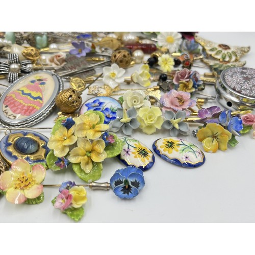 1198 - A large collection of hat pins, trinket boxes and brooches