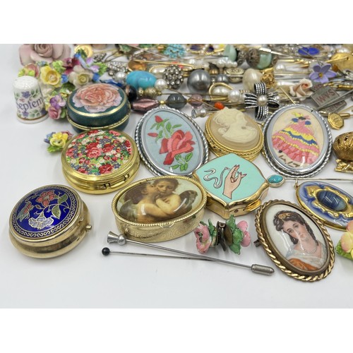 1198 - A large collection of hat pins, trinket boxes and brooches