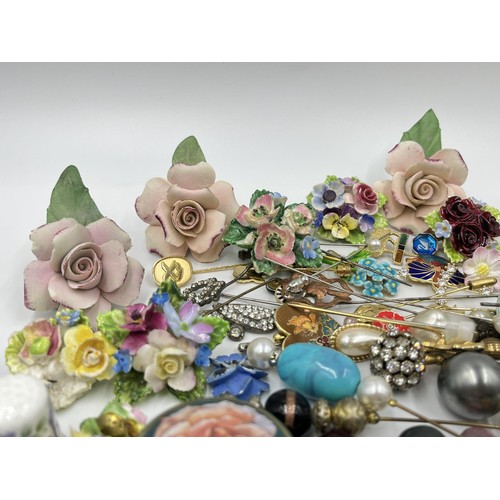 1198 - A large collection of hat pins, trinket boxes and brooches