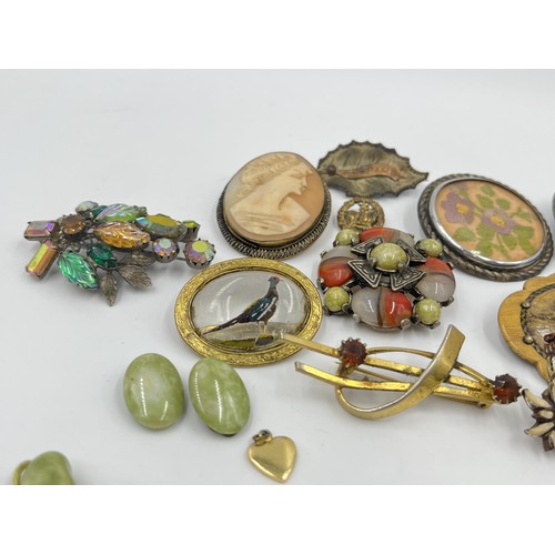 1201 - A collection of vintage costume jewellery to include Miracle brooch, cameo brooch etc.