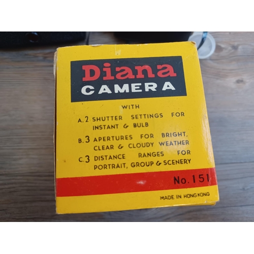 632 - Two boxed vintage lightweight plastic body cameras, one Diana No.151 for 120 roll film with instruct... 