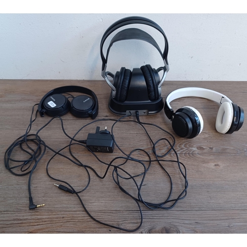 640 - Three pairs of headphones to include Sony folding, Panasonic wireless with transmitter etc.