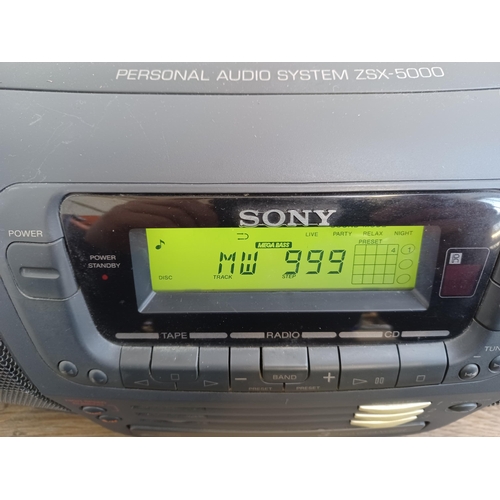 645 - A Sony ZSX-5000 portable stereo system comprising three-disc changer CD player, Dolby cassette deck ... 