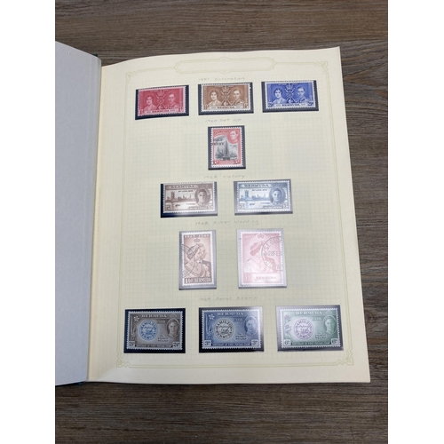 450 - A Stanley Gibbons stamp album containing Bermuda stamps