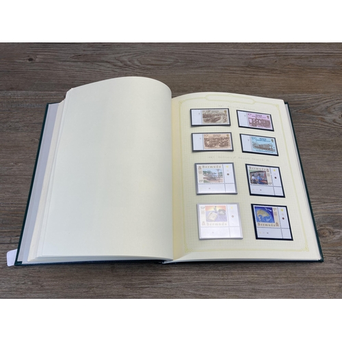 450 - A Stanley Gibbons stamp album containing Bermuda stamps