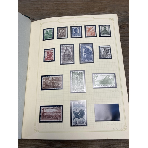 454 - A Stanley Gibbons stamp album containing Papua New Guinea stamps