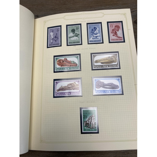 454 - A Stanley Gibbons stamp album containing Papua New Guinea stamps