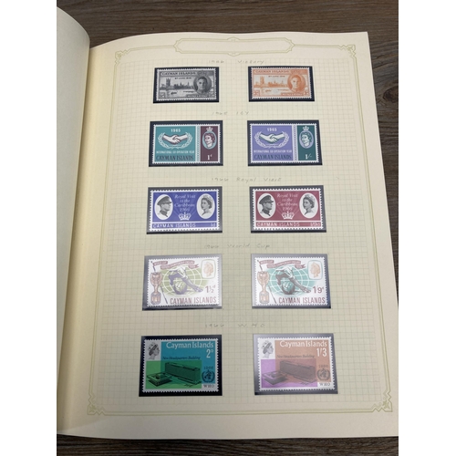 459 - A Stanley Gibbons stamp album containing Cayman Islands stamps