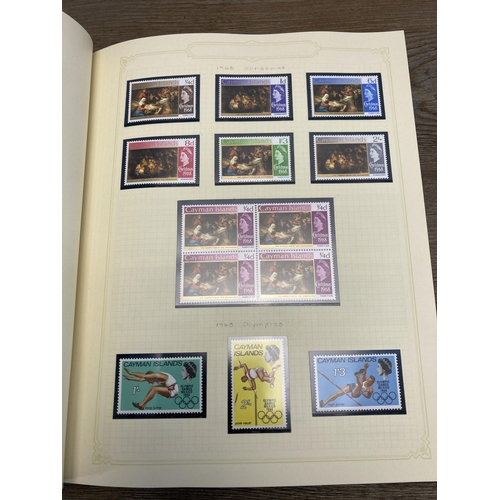 459 - A Stanley Gibbons stamp album containing Cayman Islands stamps