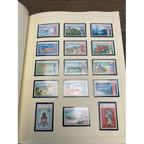 459 - A Stanley Gibbons stamp album containing Cayman Islands stamps