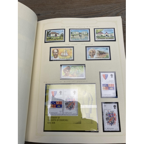 459 - A Stanley Gibbons stamp album containing Cayman Islands stamps