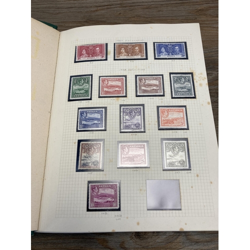 465 - A Stanley Gibbons stamp album containing Antigua and Turks and Caicos stamps