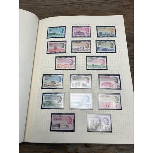 465 - A Stanley Gibbons stamp album containing Antigua and Turks and Caicos stamps