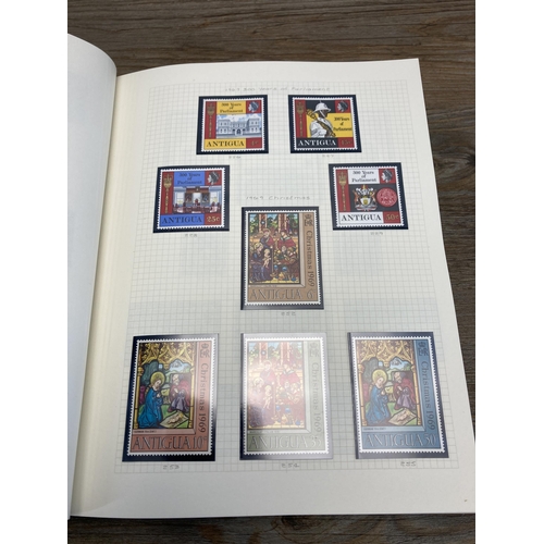 465 - A Stanley Gibbons stamp album containing Antigua and Turks and Caicos stamps