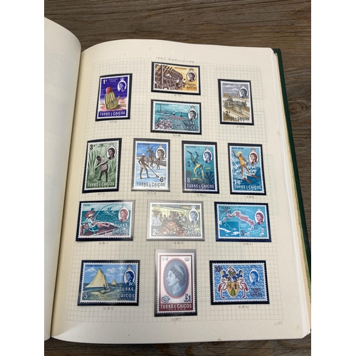 465 - A Stanley Gibbons stamp album containing Antigua and Turks and Caicos stamps