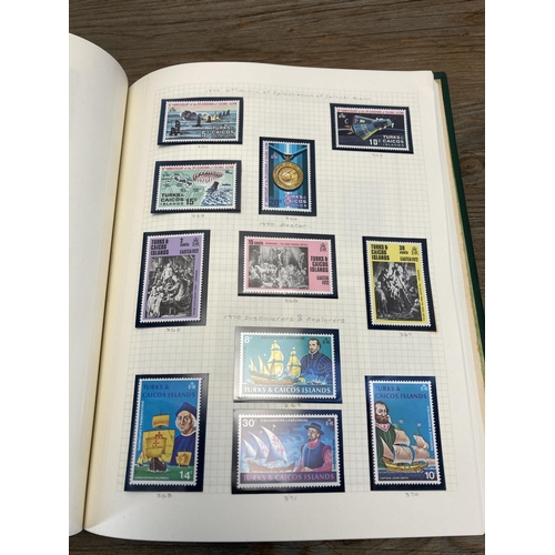 465 - A Stanley Gibbons stamp album containing Antigua and Turks and Caicos stamps