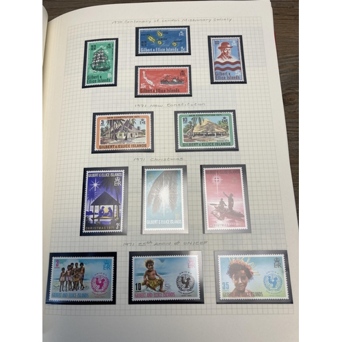 469 - A Stanley Gibbons stamp album containing Kiribati and Gilbert Islands stamps