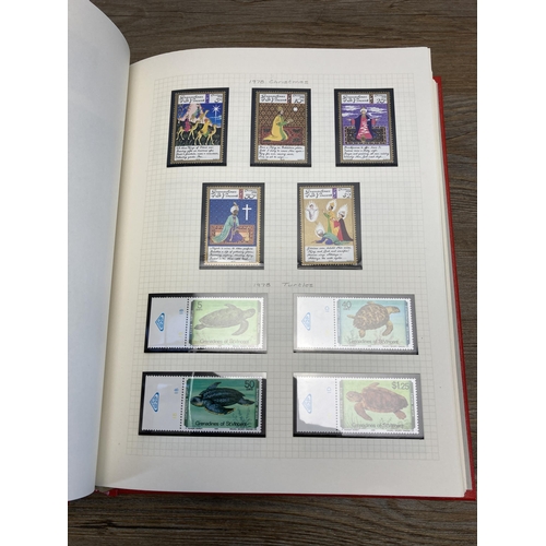 477 - A Stanley Gibbons stamp album containing St Vincent and South Georgia stamps