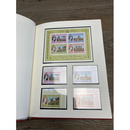 477 - A Stanley Gibbons stamp album containing St Vincent and South Georgia stamps