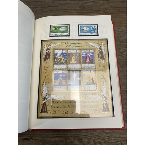 477 - A Stanley Gibbons stamp album containing St Vincent and South Georgia stamps