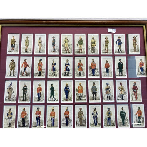 491 - A framed collection of 1930s John Player & Sons Military Uniforms of the British Empire Overseas cig... 