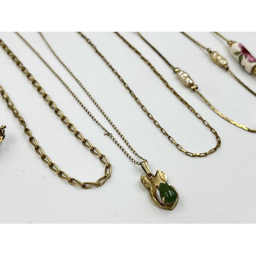 1207 - A collection of 14ct gold filled and plated necklaces together with 22ct gold lined pin badges