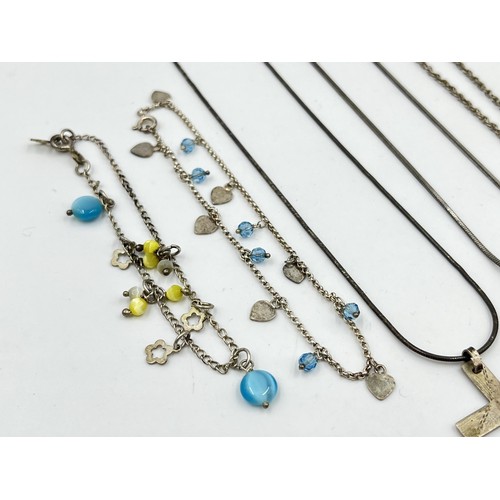 1209 - A collection of .925 silver necklaces and bracelets to include heart shaped locket etc. - approx. gr... 