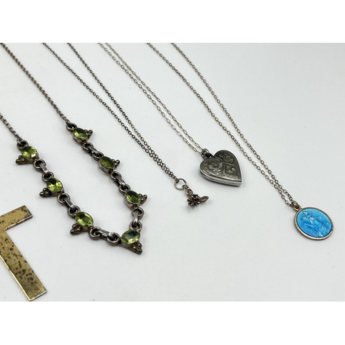 1209 - A collection of .925 silver necklaces and bracelets to include heart shaped locket etc. - approx. gr... 