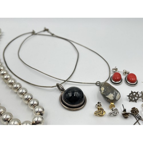 1213 - A collection of .925 silver necklaces and earrings to include coral, amethyst etc.