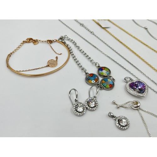 1214 - A collection of jewellery to include Murano Millefiori bracelet,  gold tone sapphire pendant necklac... 