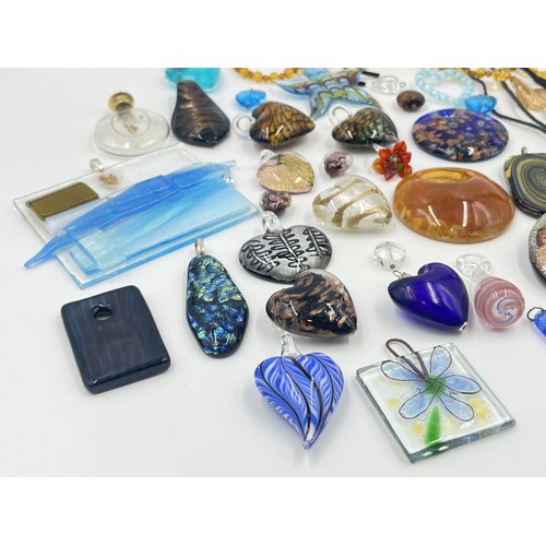 1225 - A collection of art glass pendants