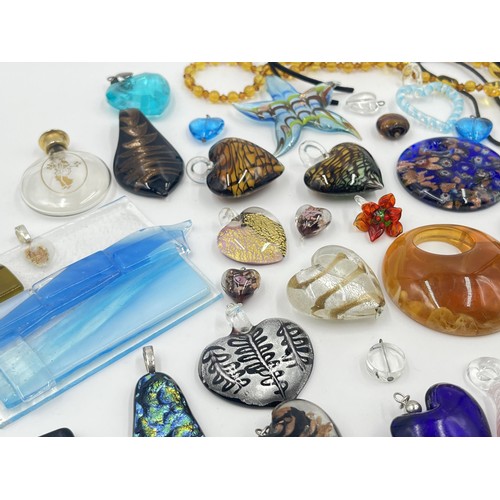 1225 - A collection of art glass pendants