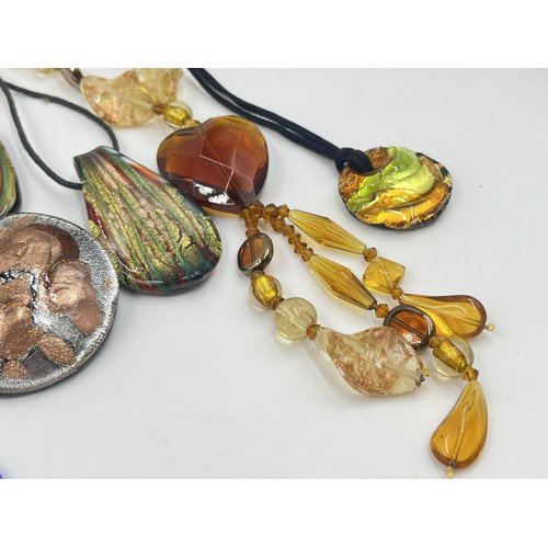 1225 - A collection of art glass pendants