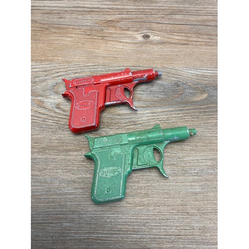 309 - Ten vintage toy guns to include Spaceman tin plate, Lone Star Spudmatic etc.