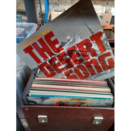 699 - Three record cases and a box containing a collection of LP and 7