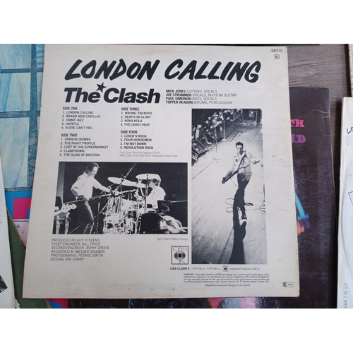 700 - A collection of shellac and vinyl records to include The Clash 'London Calling' (CBS CLASH3) and 'Th... 