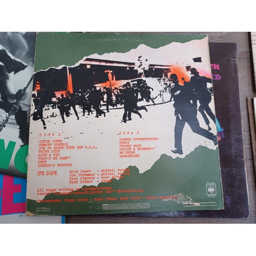 700 - A collection of shellac and vinyl records to include The Clash 'London Calling' (CBS CLASH3) and 'Th... 