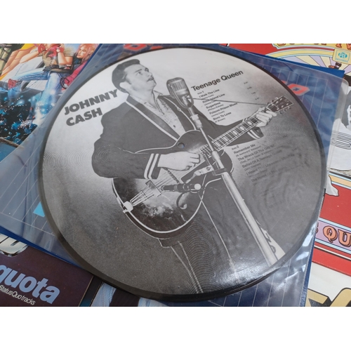 710 - A collection of LP vinyl records to include Johnny Cash picture Disc, Status Quo, Gillan etc.