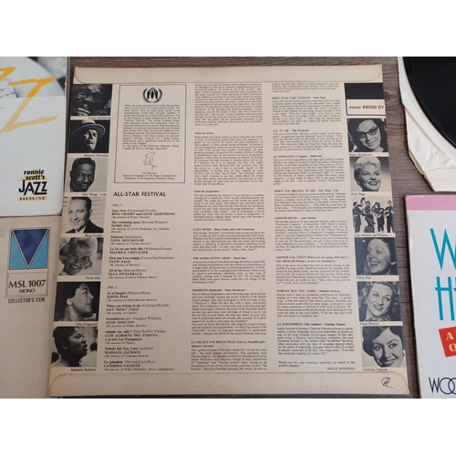 713 - A collection of jazz LP vinyl records to include Duke Ellington, Fats Waller, Sarah Vaughan, Bud Pow... 